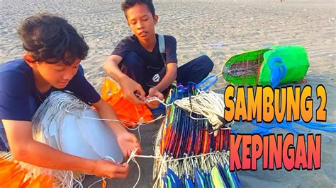 Pelayang Canden Terbangkan Layangan Naga Sambung Kepingan Di Pantai