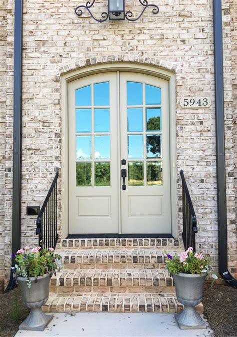 French Provincial Home With Oyster Pearl Brick And Light Buff Mortar