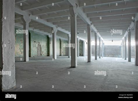 Interior of an abandoned warehouse Stock Photo - Alamy