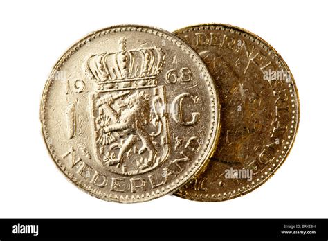 Old Dutch silver guilder isolated over white Stock Photo - Alamy