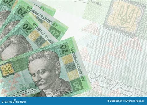 Billetes De Hryvnias Ucranianos Apilados Sobre El Fondo De Un Gran