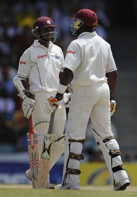 Shivnarine Chanderpaul And Dwayne Bravo Chat During Their 122 Run Stand