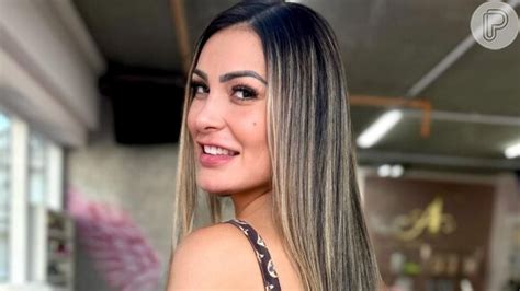 Andressa Urach rebola de maiô cavado para promover vídeo pornô e mostra