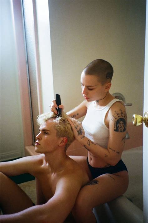 The Woman Is Getting Her Hair Done By The Man In The Bathtub With