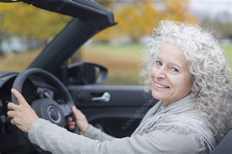 Portrait Smiling Senior Woman Driving Convertible Stock Image F0216665 Science Photo Library