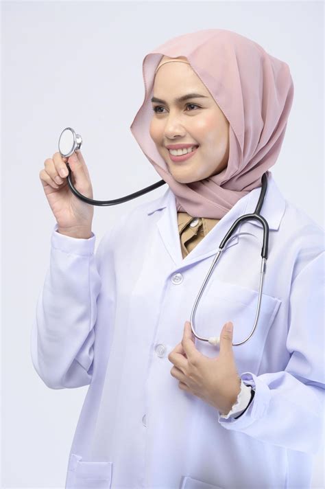 Female Muslim Doctor With Hijab Over White Background Studio 5557882