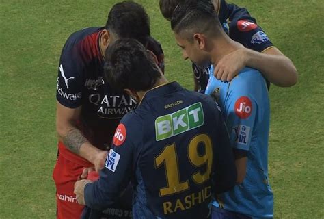 Virat Kohli Gives Autograph To Rashid Khan After Gt Knock Rcb Out Of