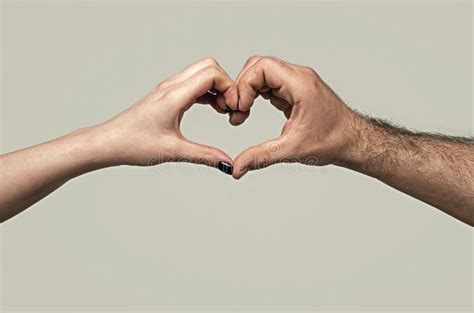 Female And Male Hands In Form Of Heart Hands In Shape Of Love Heart