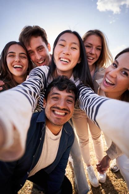 Premium Photo Group Diverse Happy Young Friend Taking Selfie Together