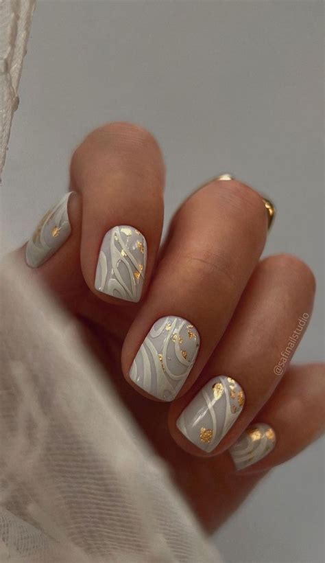 35 Nail Trends 2023 To Have On Your List White Swirl Short Nails