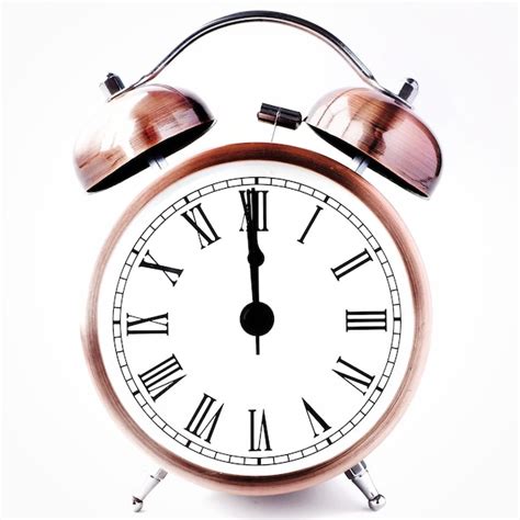 premium photo minimalist vintage roman numeral alarm clock isolated