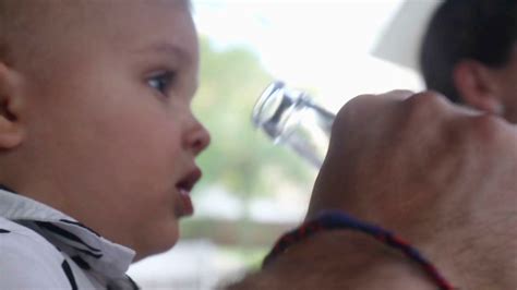 Baby Drinking Water From Glass Bottle Parent Stock Footage SBV ...