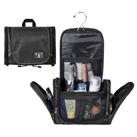 An Open Travel Bag With Various Items In It Including Toiletries And