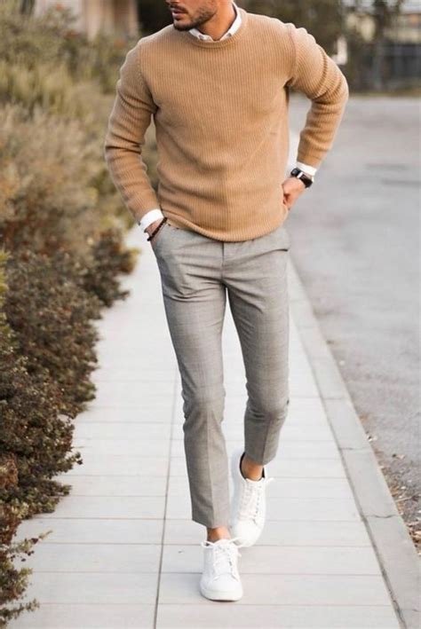 Picture Of a minimal look with a white shirt, a tan sweater, grey plaid ...