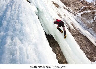 Man Climbing Frozen Waterfall Stock Photo Shutterstock