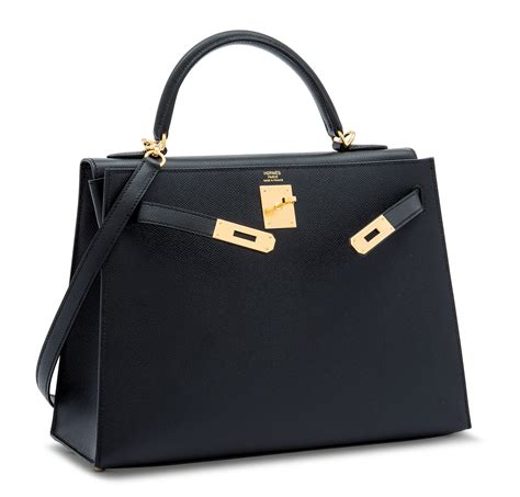 A BLACK EPSOM LEATHER SELLIER KELLY 32 WITH GOLD HARDWARE HERMÈS