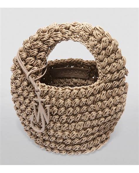 Jw Anderson Medium Woven Popcorn Basket Bag In Metallic Lyst