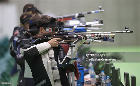 athletes compete   qualifying portion    air rifle event