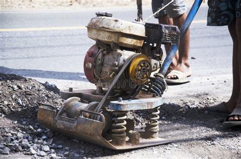 Thai People Use Soil Compactors In Construction Site Working And Stock