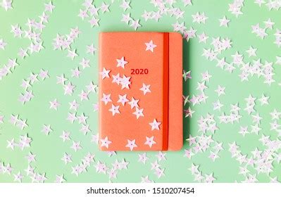 orange diary   mint background stock photo  shutterstock
