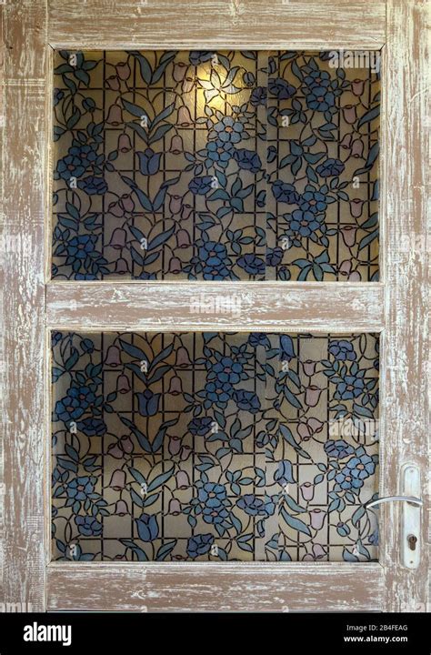 Floral Motifs In The Glass Panes Of A Door Hi Res Stock Photography And