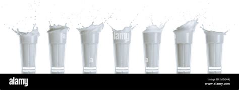 collection of glasses with milk Stock Photo - Alamy