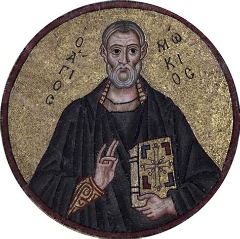 An Old Man With A Cross On His Left Hand Is Depicted In A Round Mosaic