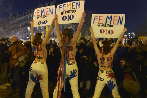 French Feminist Groups Take To Streets To Protest President Macrons