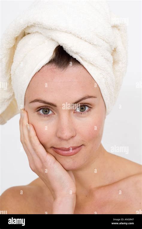 Women With Towel Wrapped Around Her Head Stock Photo Alamy