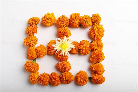 Marigold Flower rangoli Design with oil lamps for Diwali Festival ...