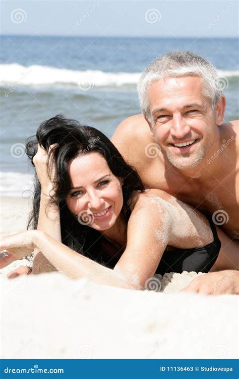 Couple Relaxing On The Beach Stock Image Image Of Male Lying 11136463