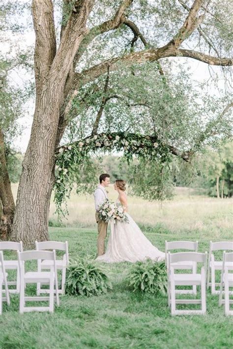 Dreamy Spring Elopement under a Floral Tree Ceremony Arch - Hey Wedding ...