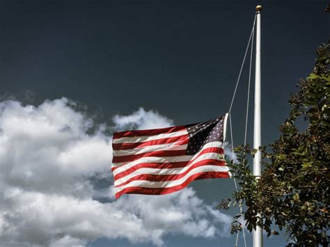 570+ American Flag At Half Mast Stock Photos, Pictures & Royalty-Free ...