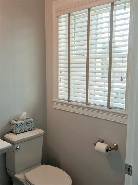 White Faux wood blinds in Foxboro Powder room. How to tell Faux wood ...