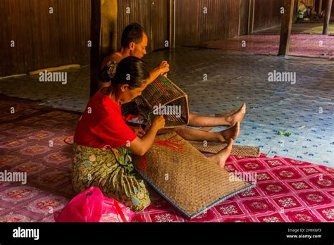 Sarawak Malaysia March Local People Waving Baskets In A