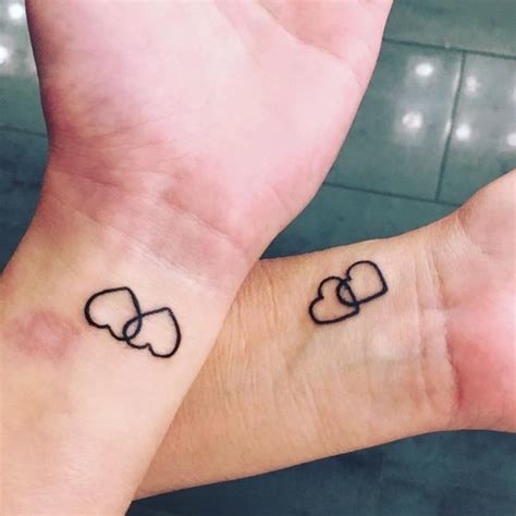 The Hearts Couple Tattoo Design - Meaningful Couple Tattoos ...