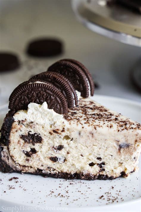 Close Up Side View Of A Slice Of Easy Oreo Cheesecake With Oreos On Top