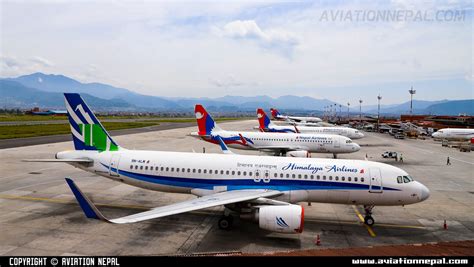 Airplanes and Helicopters on the tarmac of the Tribhuvan International ...