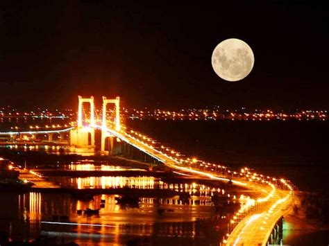 15 Stunning Images Of A Supermoon Taken In Different Locations