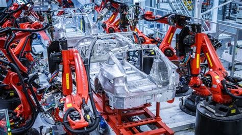 How does Tesla build its cars? We'll show you - CNET