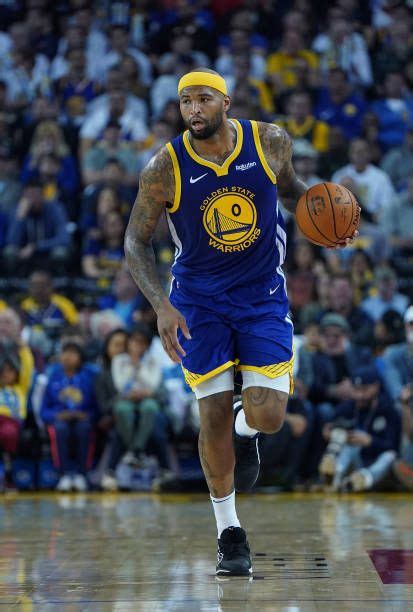 Demarcus Cousins Of The Golden State Warriors Dribbles The Ball Up Golden State Warriors