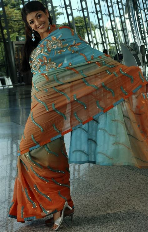 Actress Kajal Agarwal Hot Orange Saree Images
