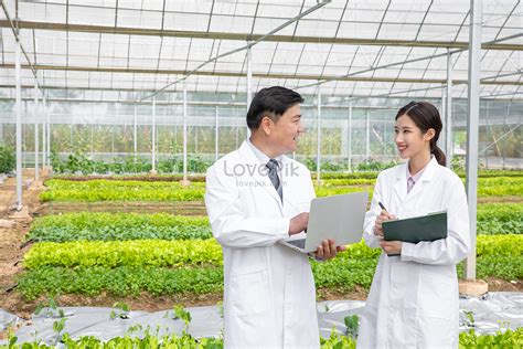 Agricultural Cultivation Scientists Holding Computer Research Picture ...