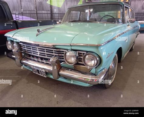 Cyan Amc Rambler Ambassador Four Door Sedan 1962 Parked In A Warehouse Yard Front View Classic