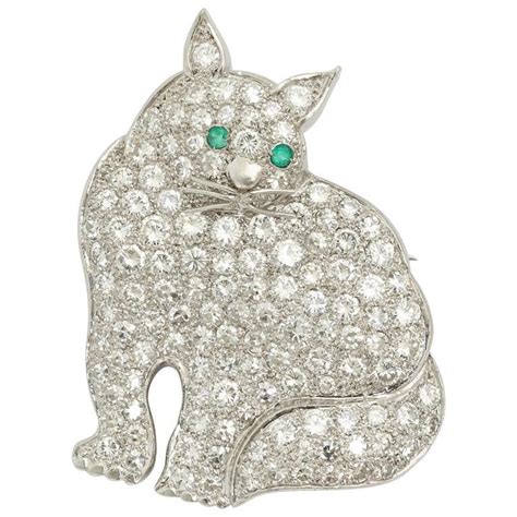 1930s Emerald Diamond Platinum Figural Green Eyed Kitty Cat Brooch