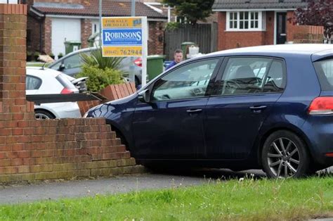 Car Crashes Into Garden Wall After Smash Involving Two Year Old Girl