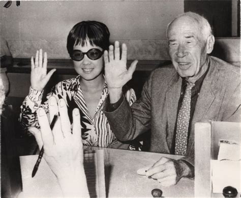 Original Photograph Of Henry Miller And Hoki Tokuda Applying For A