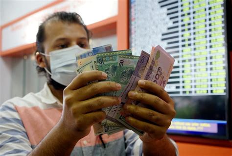 Ringgit Opens Lower Versus Us Dollar