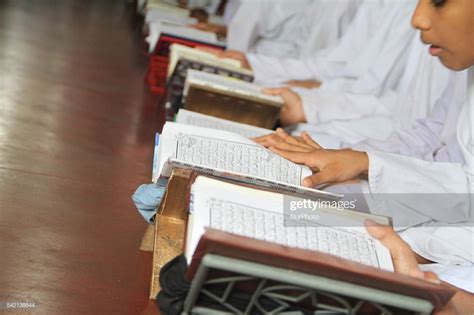 Bangladeshi Muslims Read Quran At A Madrasa During The Reading Al