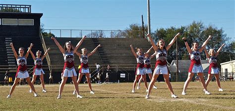 Mustang Cheer Boosters: Varsity Cheerleaders support "little" Mustangs ...